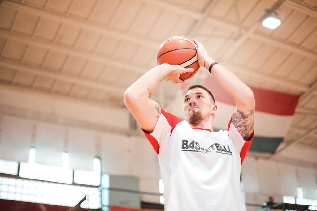 man at basketball practice working on practicing more at his passion